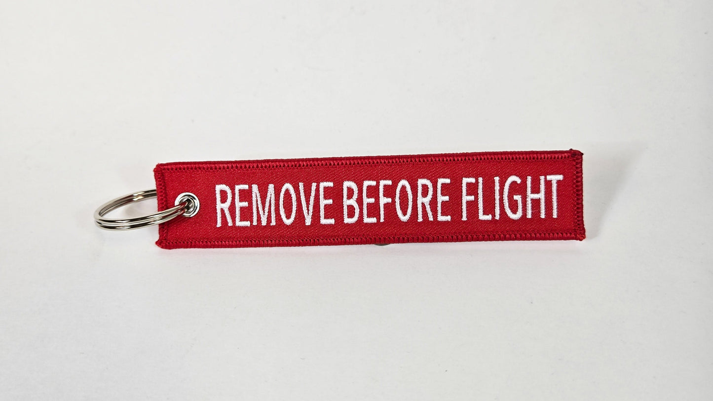 "REMOVE BEFORE FLIGHT" EMBROIDERED KEYCHAIN