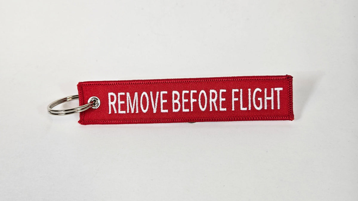 "REMOVE BEFORE FLIGHT" EMBROIDERED KEYCHAIN