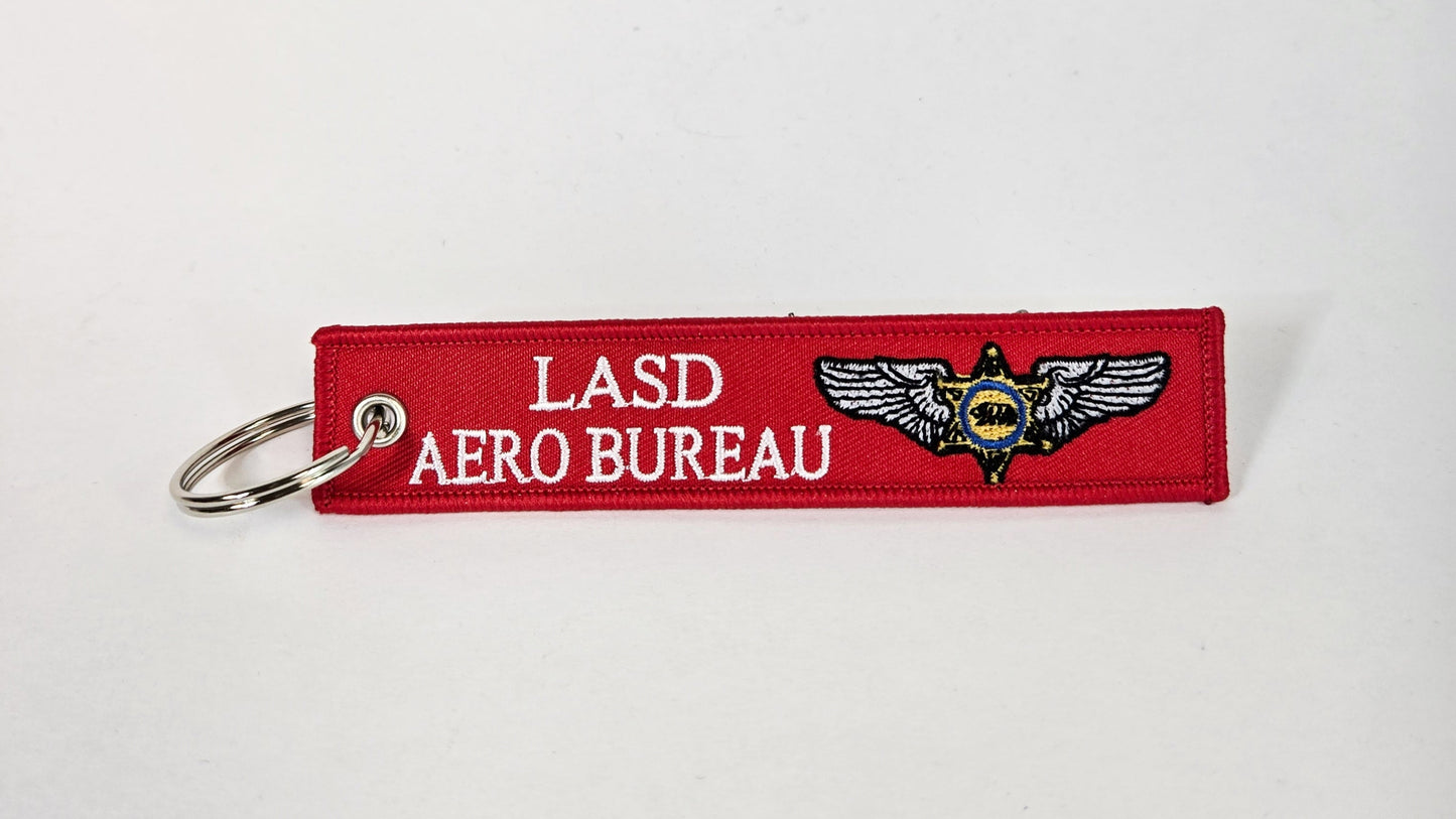 "REMOVE BEFORE FLIGHT" EMBROIDERED KEYCHAIN